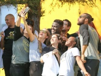 Group of young adult 鶹ý students take a selfie