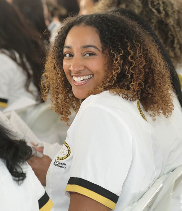 student during white coat ceremony