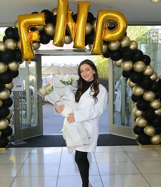 student during white coat ceremony