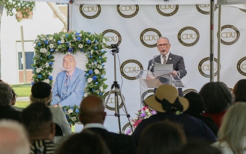 Dr. Carlisle speaking during Dr. Wilbert C. Jordan's memorial.