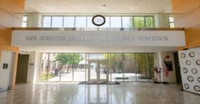 Interior lobby of CDU building with glass windows and doors