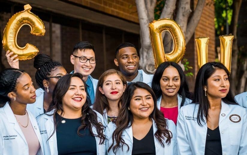 CDU students in white coats