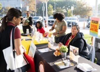 CDU staff members helping community members at resource fair