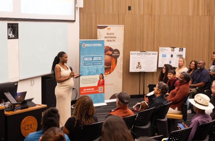 woman speaking during presentation
