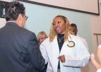 Rad Tech student in White Coat