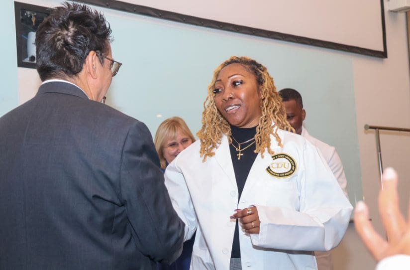 Rad Tech student in White Coat