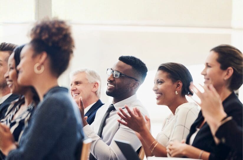 men and women clapping