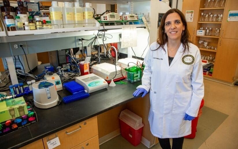 Susanna Cavallero standing in research lab