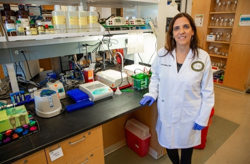 Susanna Cavallero standing in research lab