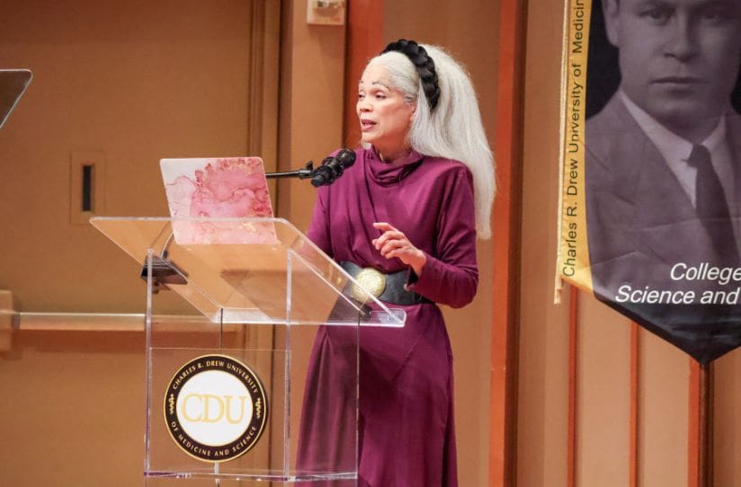 Connie-Rice-speaking-at-podium