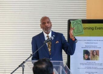 John Patton holding Green Book