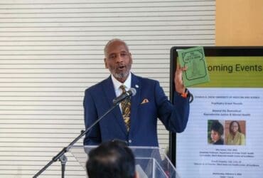 John Patton holding Green Book