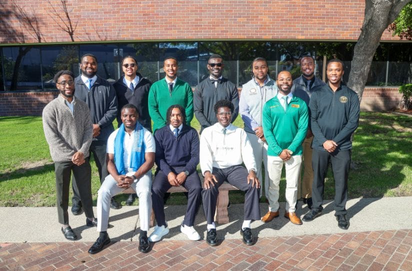 Coalition of Black men physicians wearing business attire