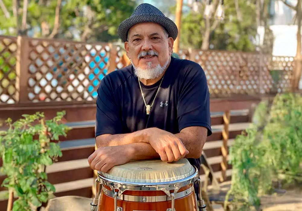 Poncho Sanchez in front of drum